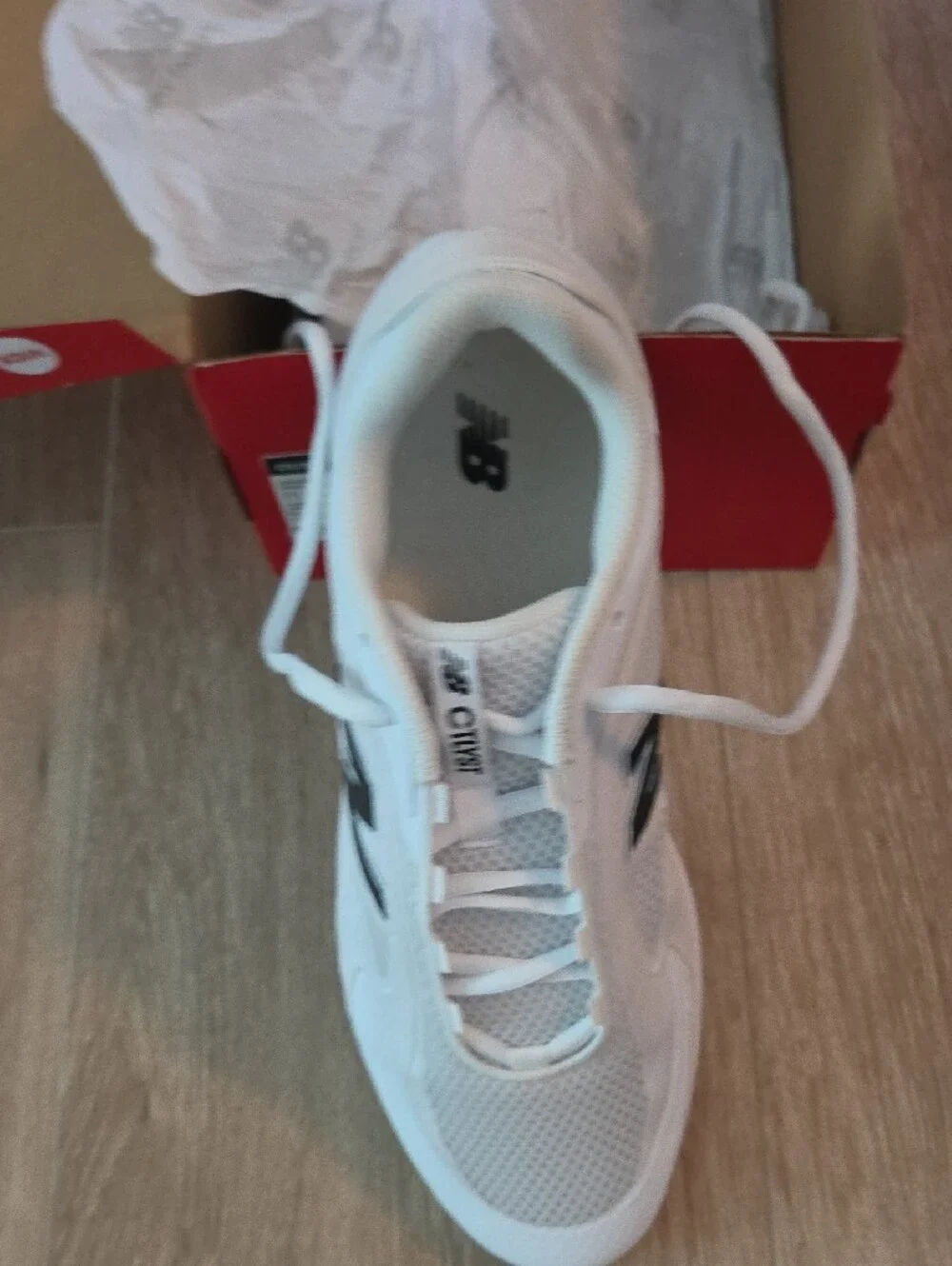 New Balance Women's White Sneakers with Black 'N' Accents